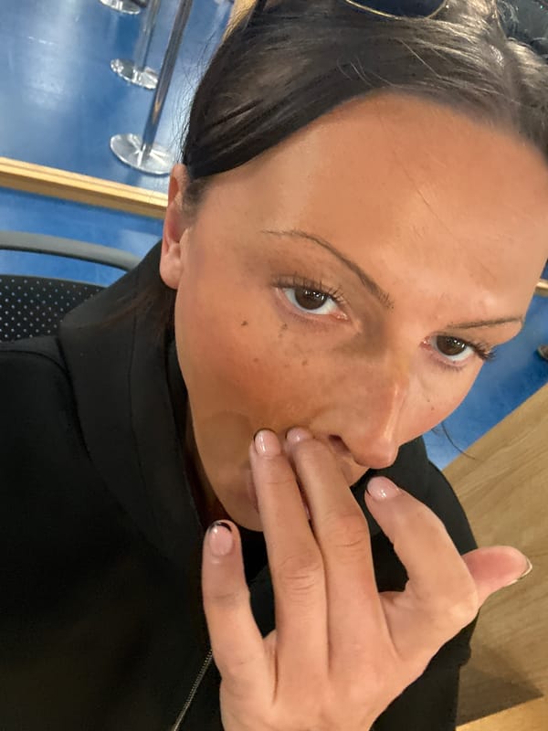 Woman documents passport office visit in London
