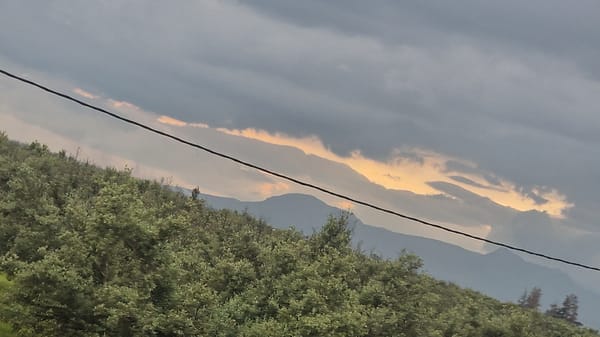 Orange-lit clouds observed above power line in Ain Chkef