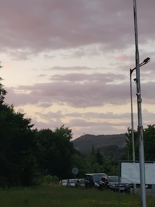 Dusk sky over Gabrovo, Bulgaria with street infrastructure in view