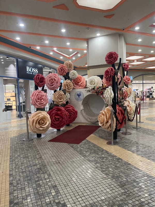 Big artificial rose display inside a shopping mall