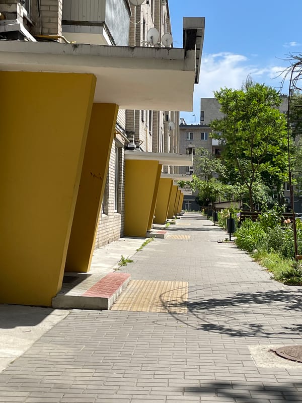 Building with yellow balconies documented in Brest, Belarus
