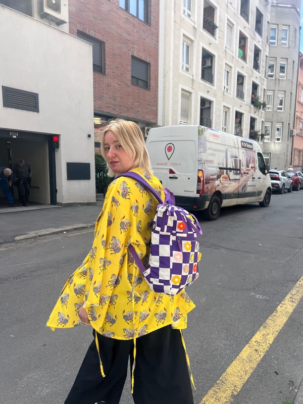 Woman in horse-patterned jacket spotted on Vracar sidewalk
