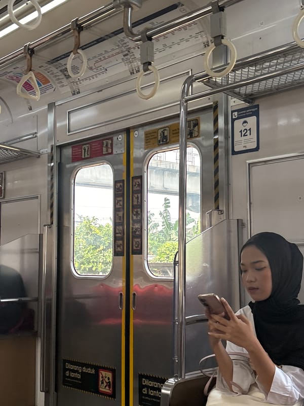 Morning commute captured on Jakarta train car June 9