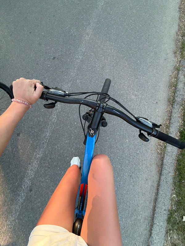 Cycling through Kyiv's riverside paths on a summer afternoon