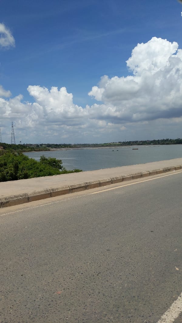 Morning bridge crossing captured from tuk-tuk in Dar es Salaam