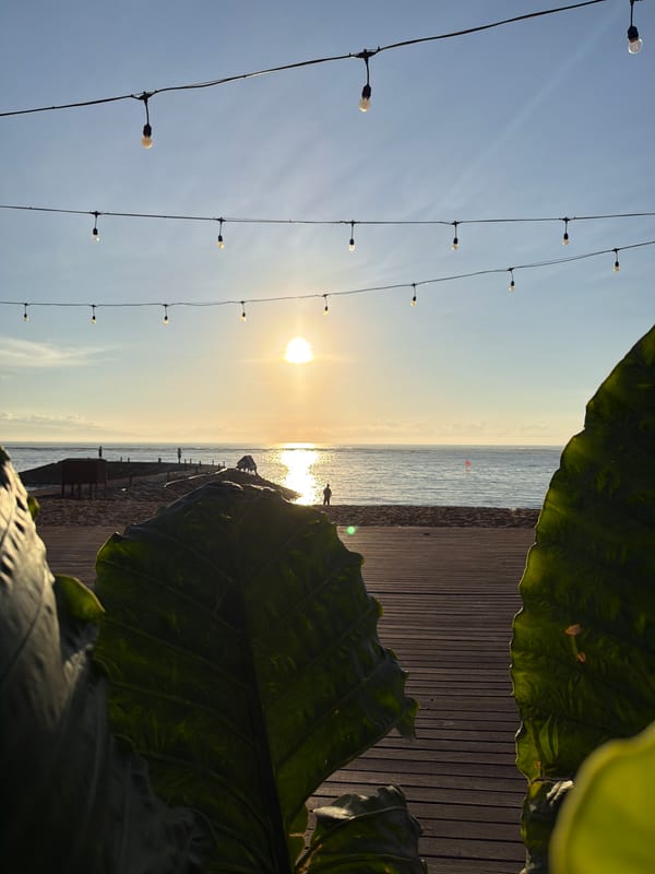 Sunset hour along Denpasar's beachfront strip