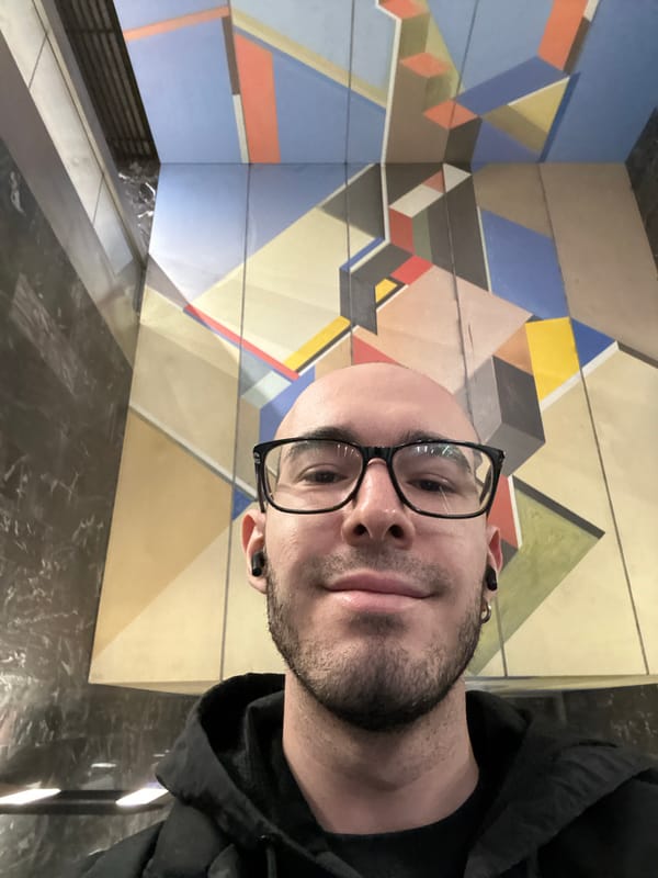 Man photographed against geometric wall in Khimki, Russia