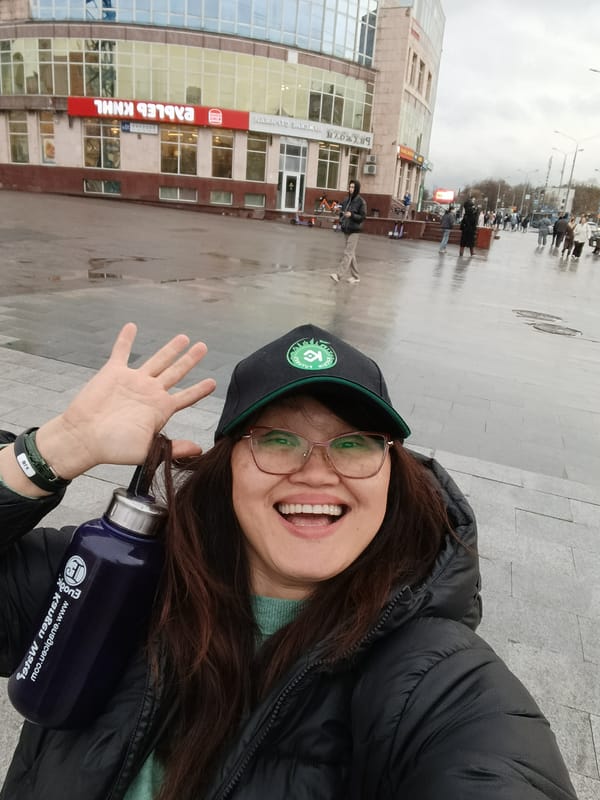 Woman takes selfie on cloudy day in Moscow