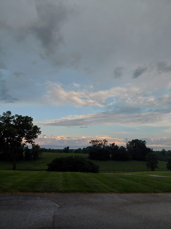 Rolling hills and stormy skies outside Richmond on Independence Day