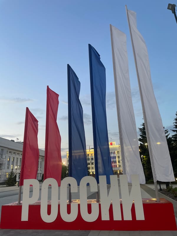 Twilight patriotic displays illuminate Vologda's government district