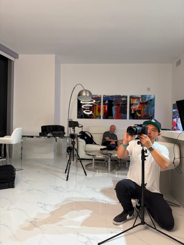 Kneeling with a camera on marble floors in Hallandale Beach