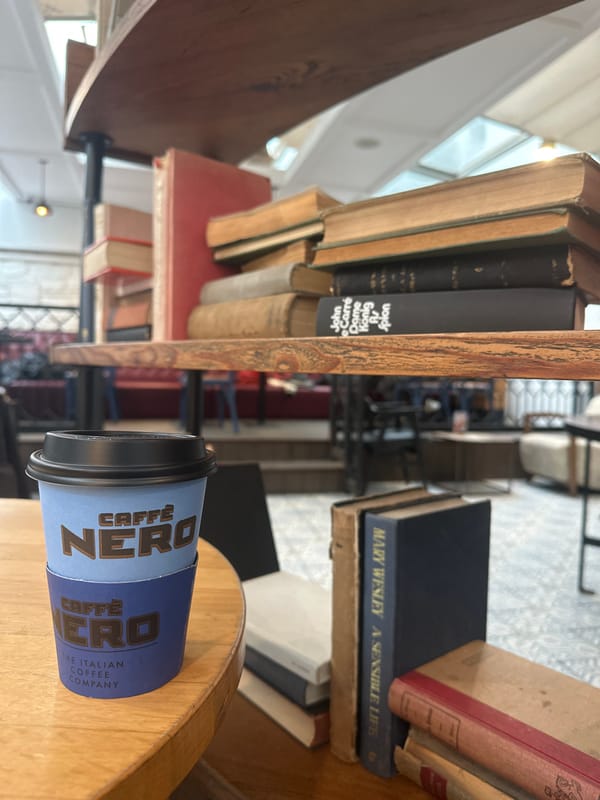 Coffee and books moment captured in Bodrum cafe setting