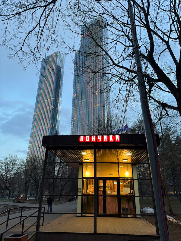 Moscow street scenes: donut shop and barking poodle captured