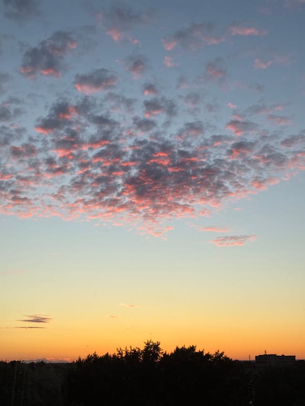 Sunset sky over a city, shot from multiple angles