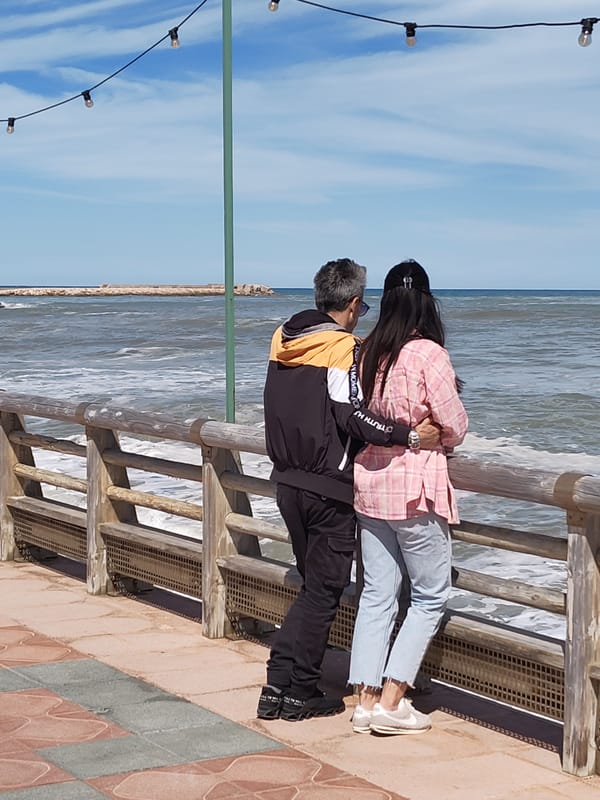 Tourists enjoy waterfront dining and ferry watching in Dénia