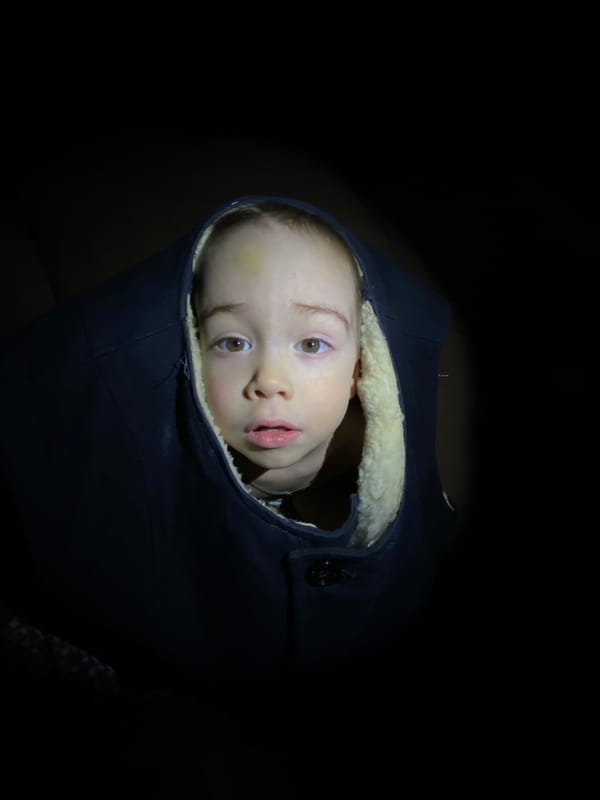 Child photographed in winter clothing in Ольховка, Russia