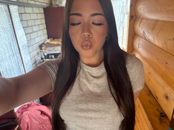 Woman takes series of selfies in Russian home