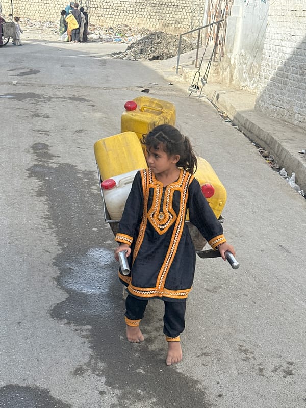 Street life on a Quetta road, midday 2026