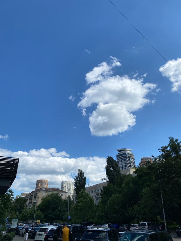 Street scenes and hand-drawn vehicles from a Kyiv morning