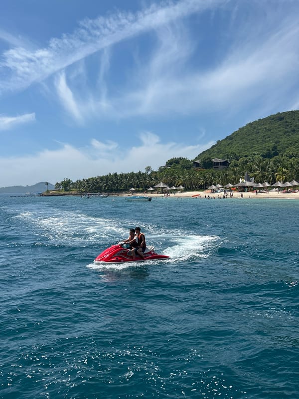 Nha Trang coastline from the water, jet ski in motion