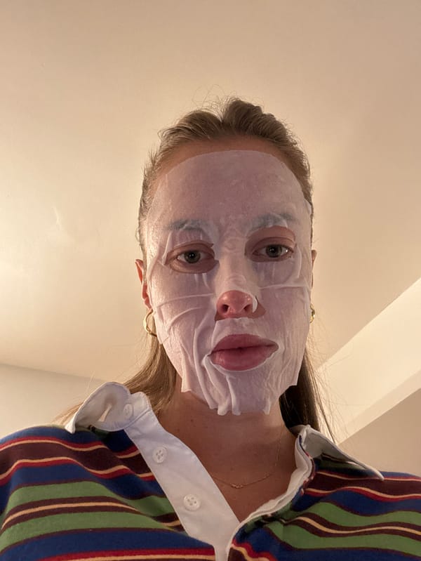 Person spotted wearing white sheet face mask