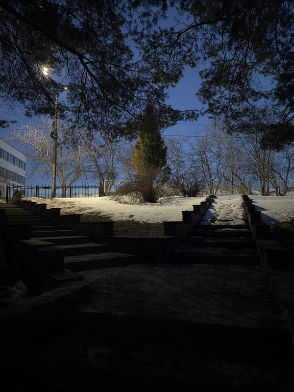Evening walk documented through snowy Chaikovsky streets at twilight