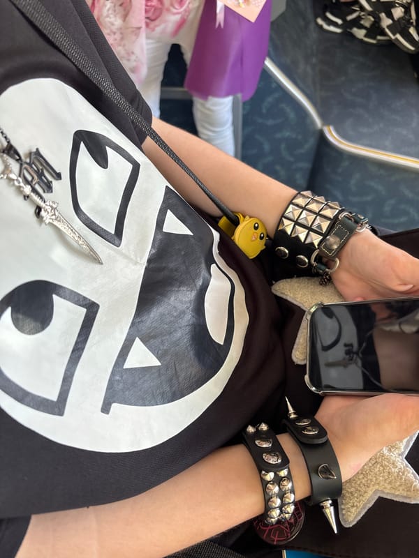 Graphic tee and wrist accessories, close up in Varna