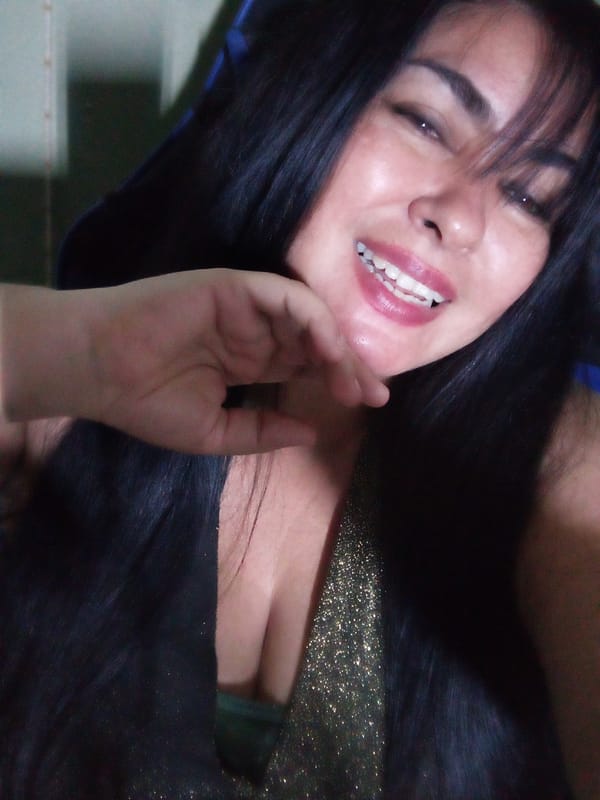 Woman takes late-night selfies in Juan Griego bedroom