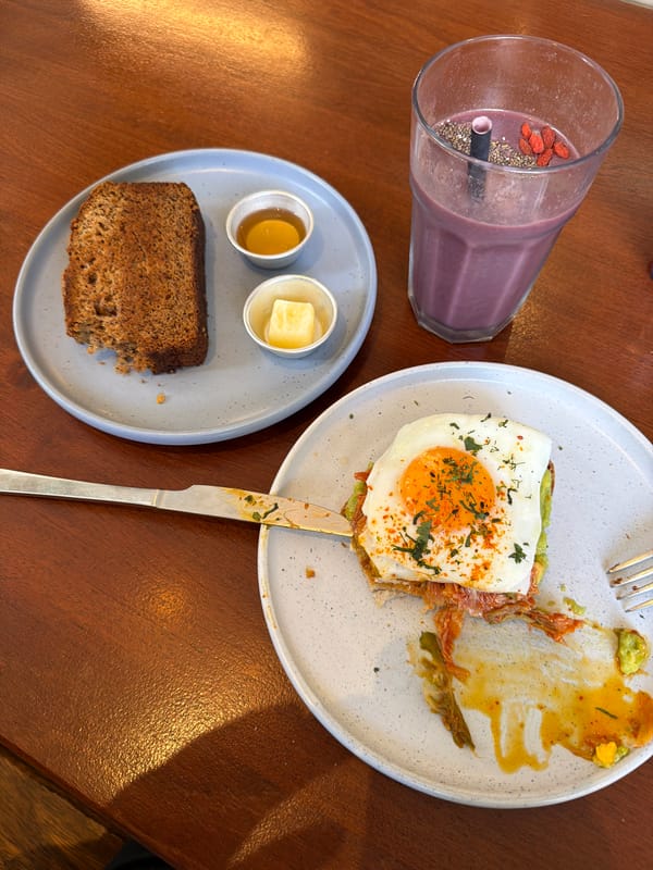 Morning meal with purple smoothie captured in Lisbon