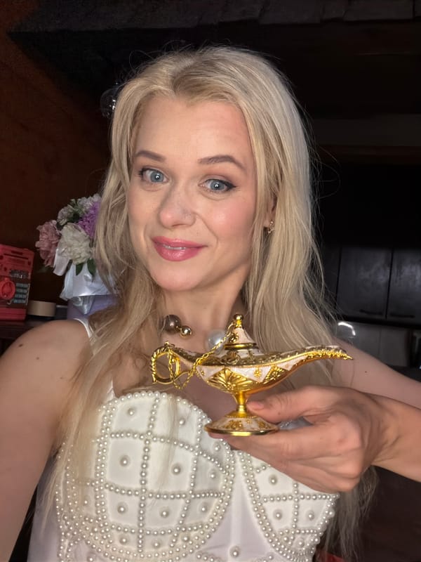 Pearl outfit, golden lamp, and flowers at a Sochi celebration