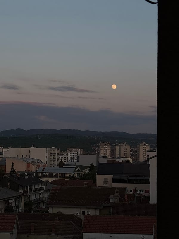 Twilight moon and indoor portrait captured in Kragujevac