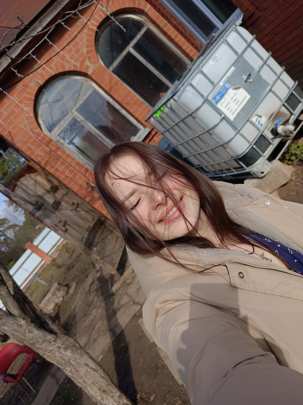 Woman Takes Early Morning Selfie in Rusalevka, Russia