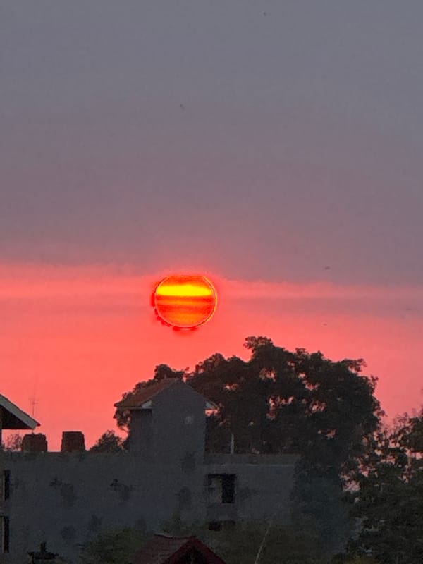 Sunset over Kuta Selatan, Bali, painted in purples and orange
