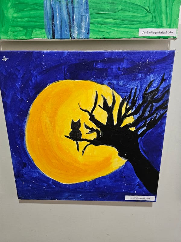 Art paintings displayed on wall in Yerevan