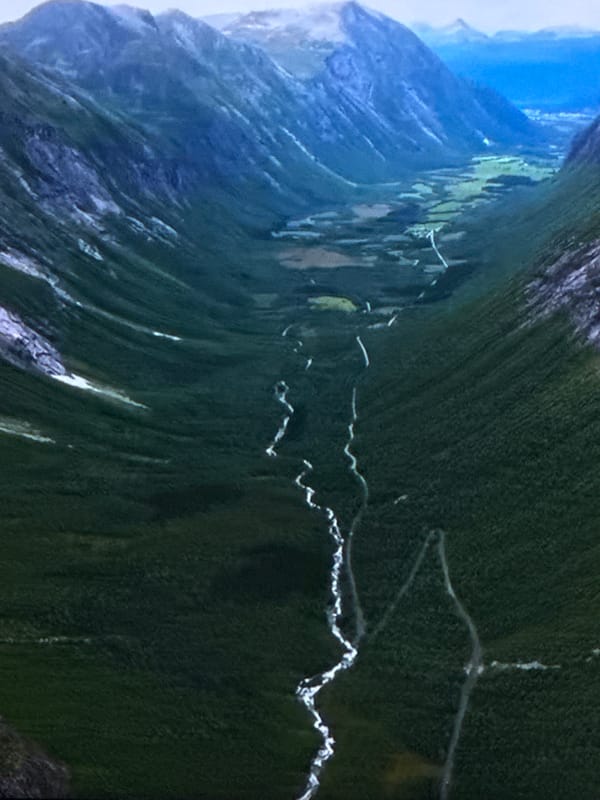 Forested valley and winding river near Sinyavino, Russia