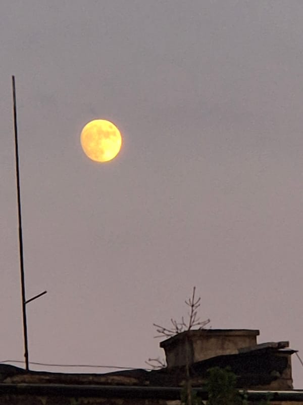 Full moon rising over Sofia rooftops, June 2026