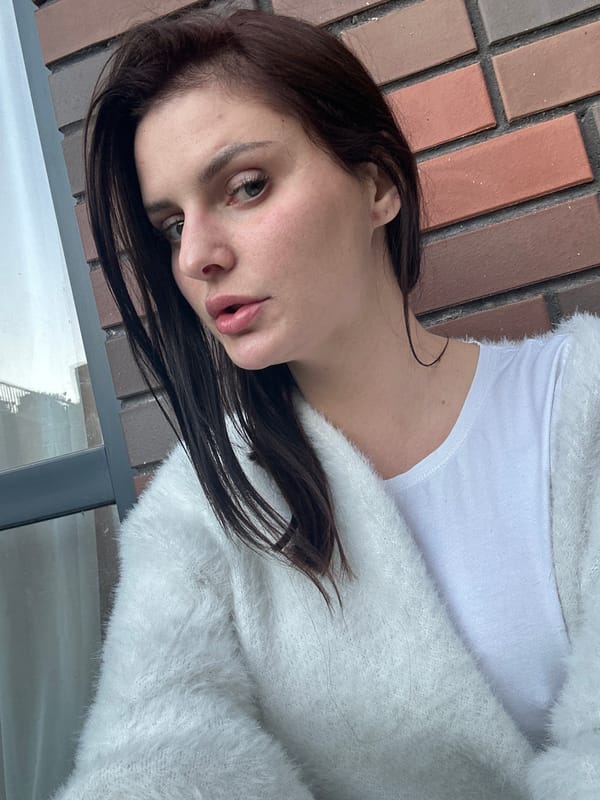 Afternoon stroll through an urban neighborhood, snacks and selfies included.
