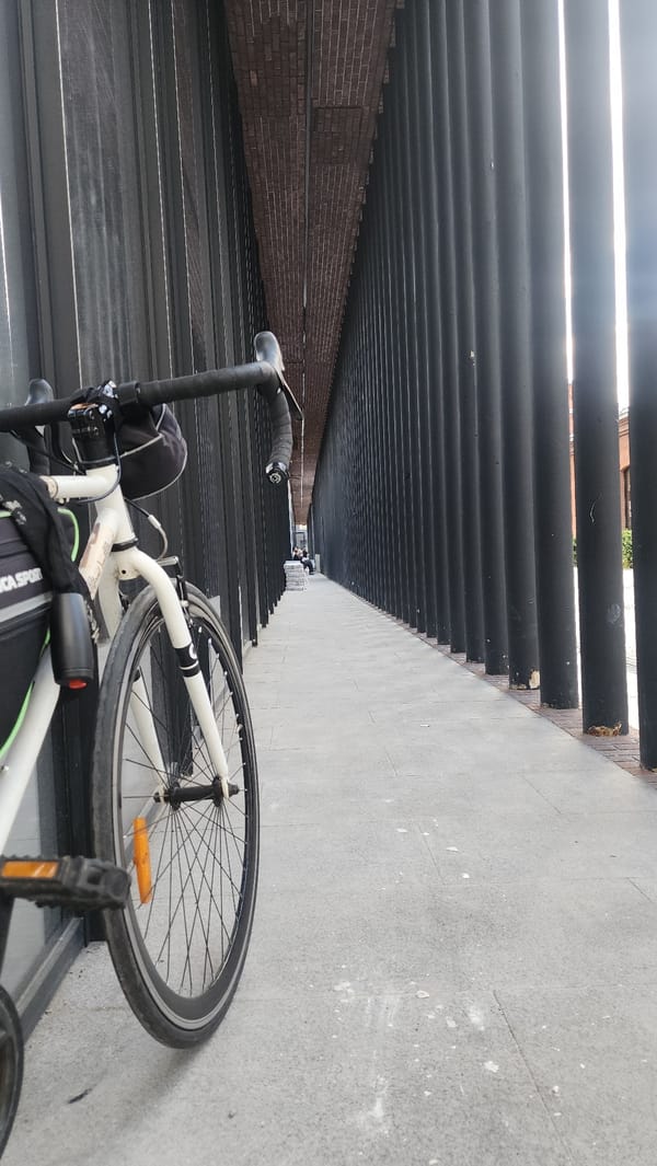 Bike stop outside a modern building, selfie in the glass