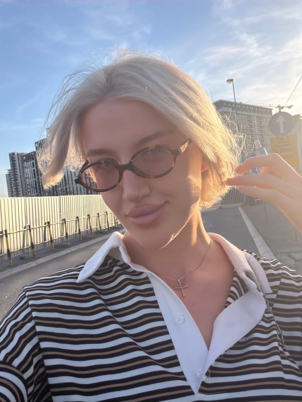 Woman takes selfies on sunny afternoon in Belgrade