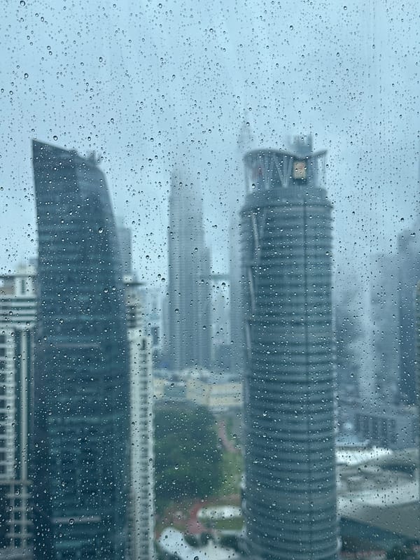 Rainy day in KL, green tea and a cookie indoors