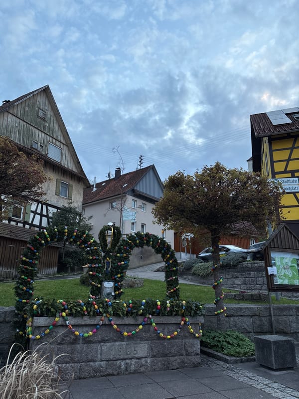 Easter decorations adorn stone structure in Forbach, Germany