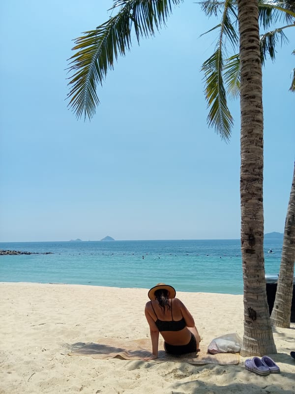 Woman enjoys beach time at Vietnam heritage area