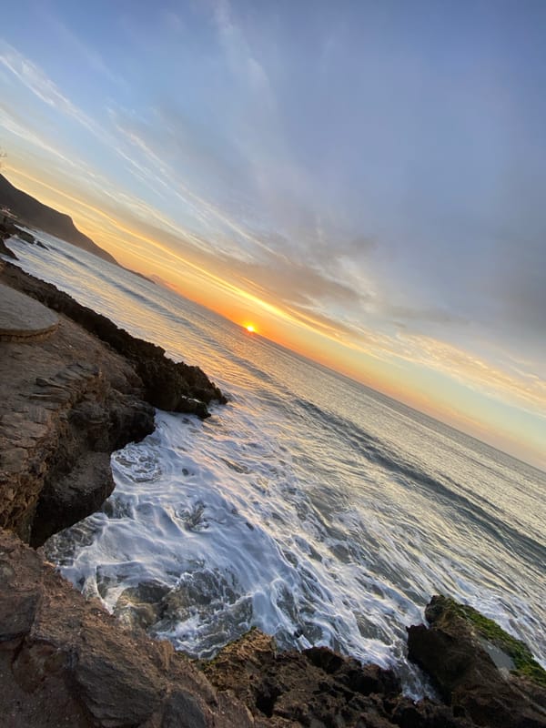 Sunset watchers gather at Juan Griego coastline