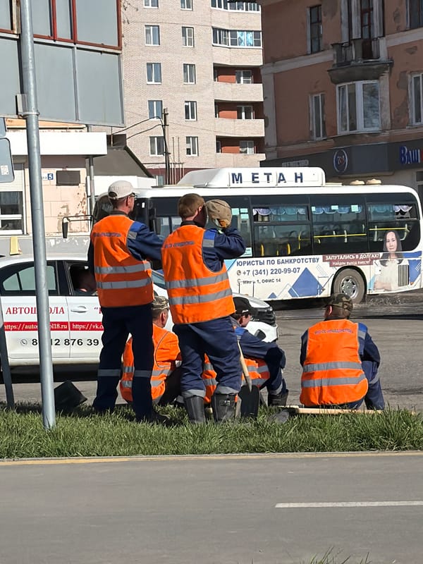 Daily life captured in Votkinsk: road work and resting cat