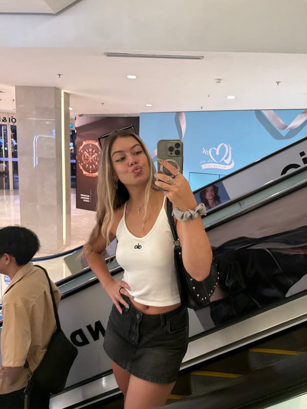 Woman takes selfies at Thủ Đức shopping mall