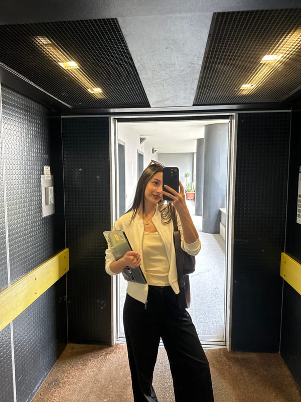 Woman takes elevator selfie in Milan