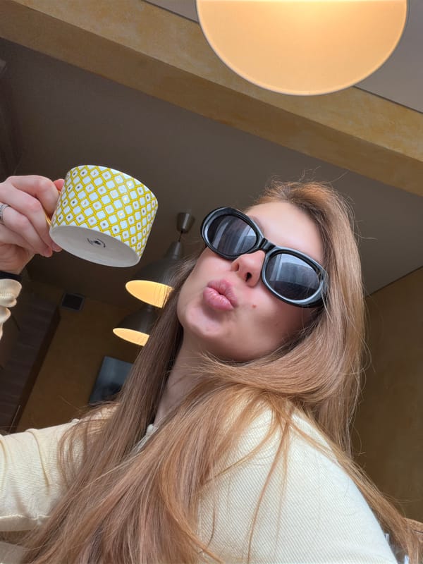 Woman photographed with coffee mug in Khimki selfie session