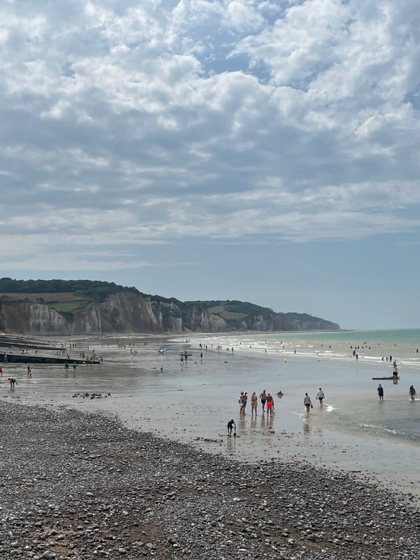 Busy summer afternoon on Hautot-sur-Mer's pebble beach