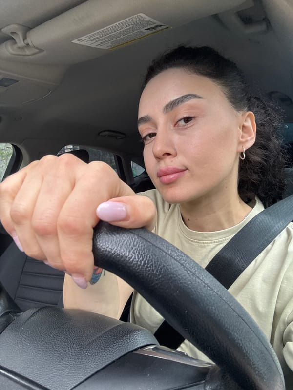 Woman observed driving in early morning Tbilisi traffic