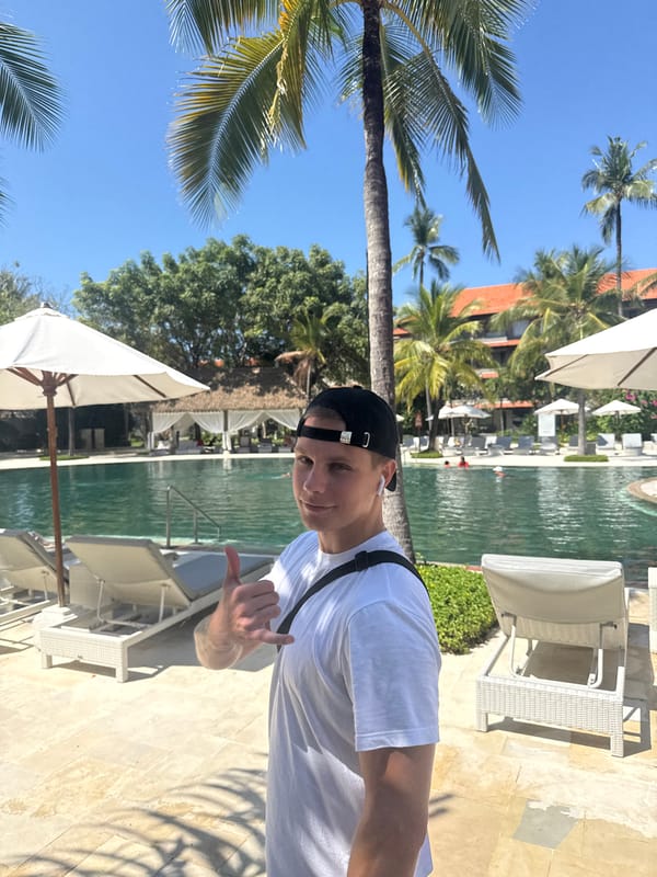 Tourist moves through Westin resort areas in Kuta Selatan